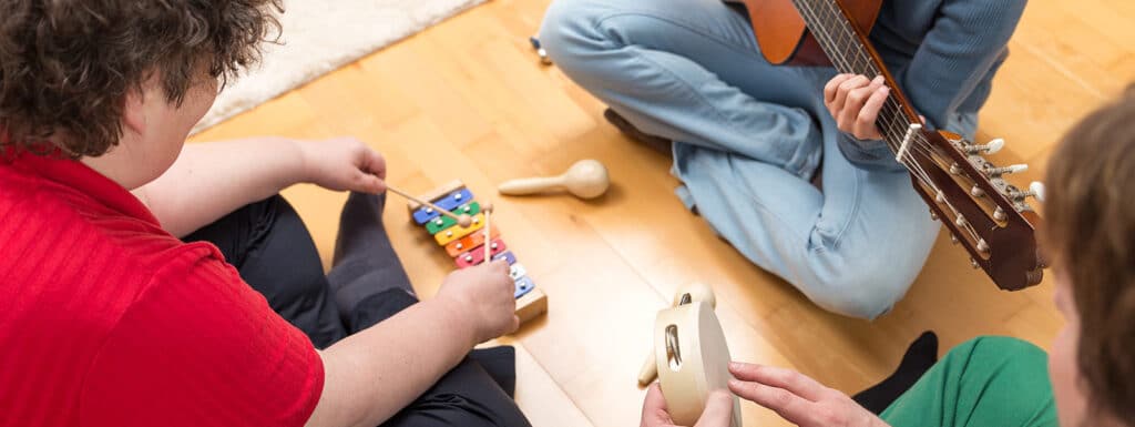 3 Participants in a music therapy group
